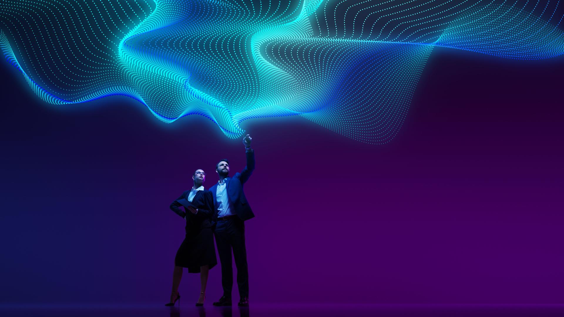 Businessmen points to data network projected above him, symbolizing connectivity and digital transformation in corporate world.